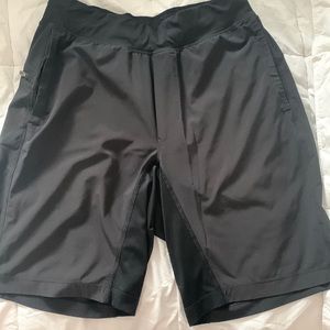 Mens. Small. T. H. E. Short. Linerless. 9 in.